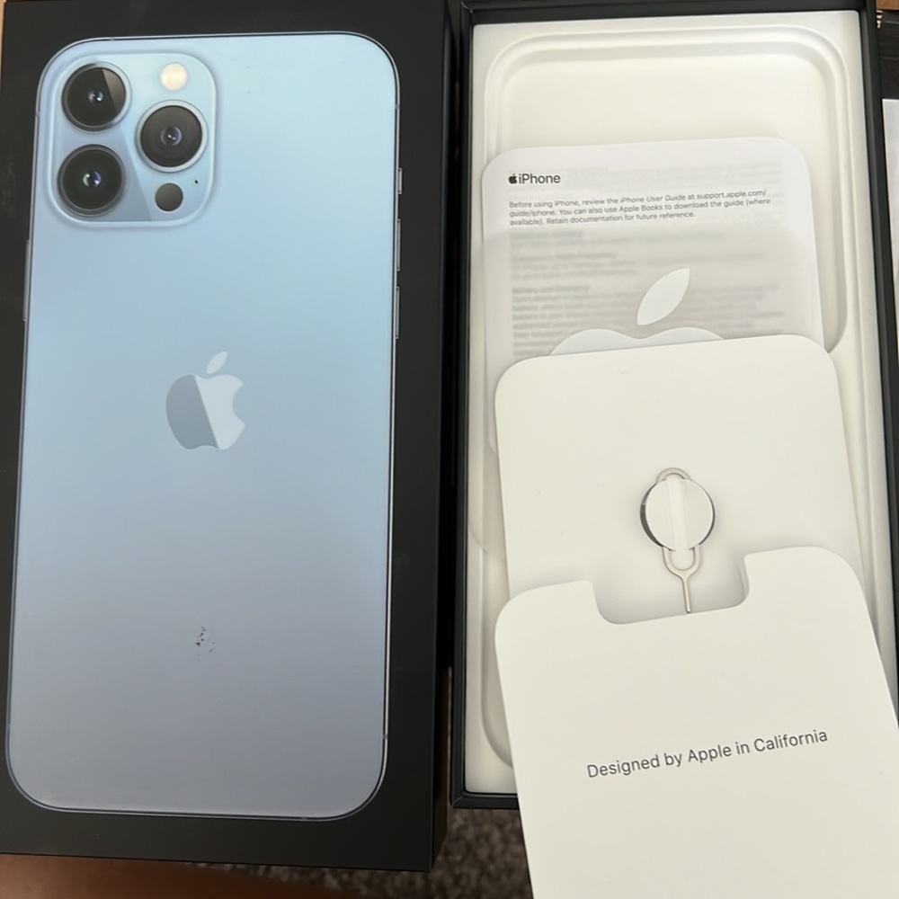 Empty iPhone 13 Pro Max blue boxes